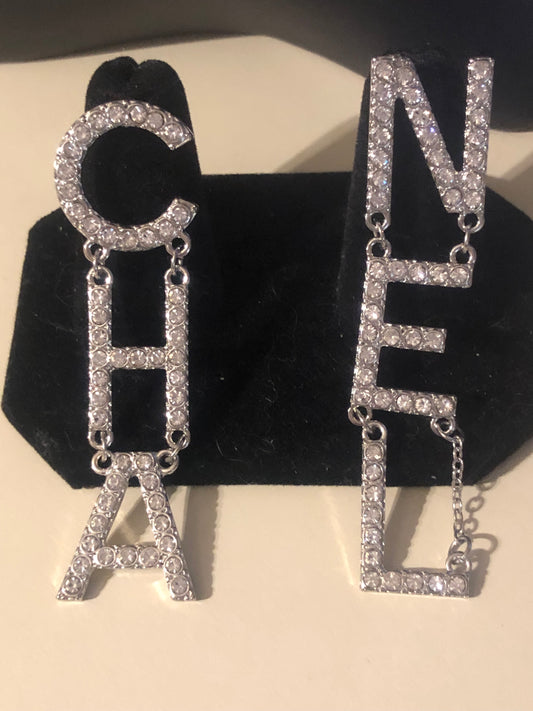 Silver Rhinestone Initial Earnings